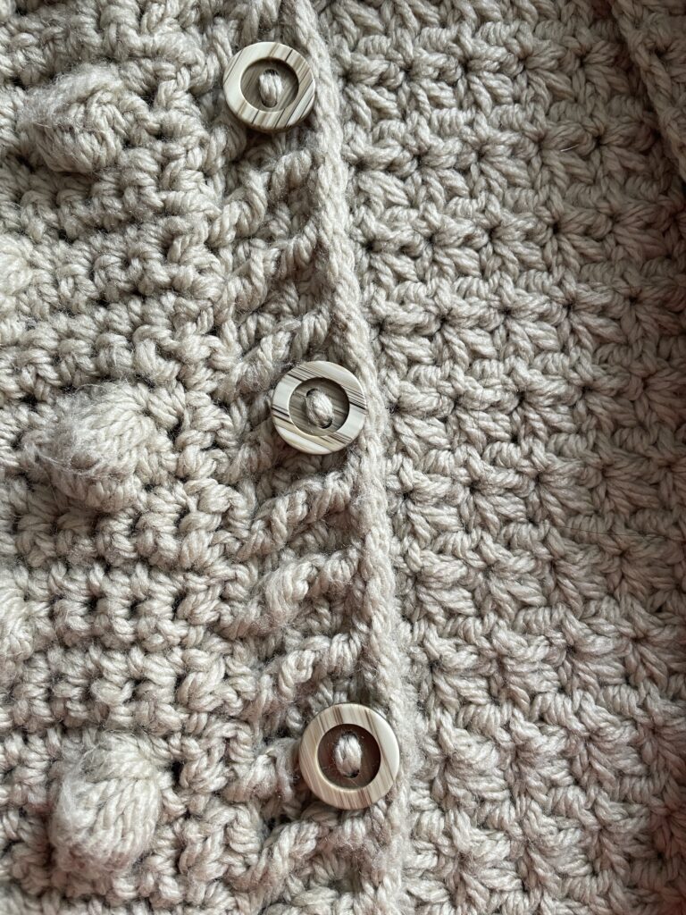 knopen op het bolletjes-gilet